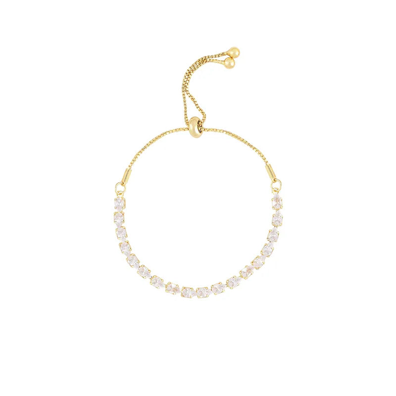 Goldenes Armband mit weißen Kristallen, verstellbar, elegantes Schmuckstück für Damen.