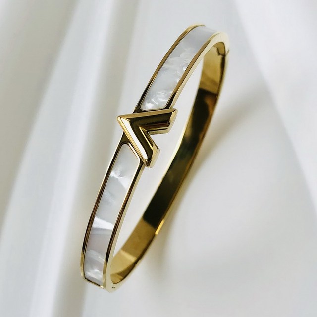 Goldenes Edelstahlarmband mit Zirkoneinlage, wasserdicht, luxuriöses Design für Damen.