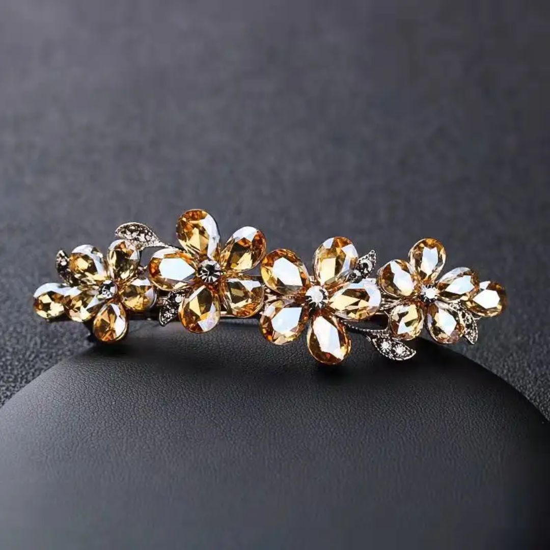 Goldene Blumen-Haarspange mit Kristallen, elegantes Accessoire, Hochzeitsschmuck, Damenmode.