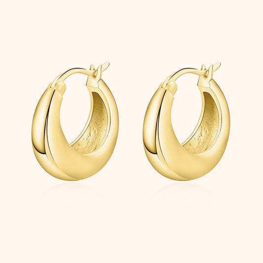Goldene Creolen Ohrringe, glänzend, aus 14 Karat Gold, modisches Schmuckstück für Damen.