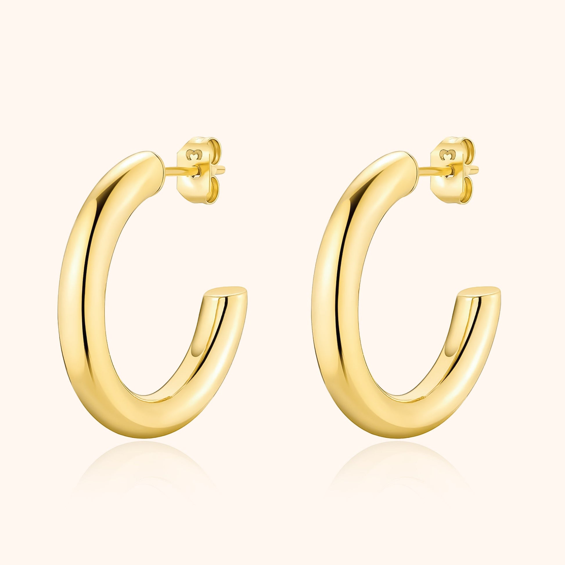 Goldene Creolen Ohrringe, glänzend, modisch, Schmuck für Damen, elegantes Design.