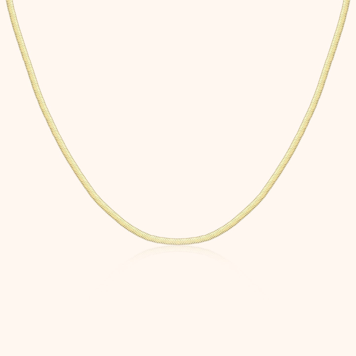 Goldene Schlangenkette, 18 Karat, elegantes Design, Schmuck für Damen, luxuriöses Accessoire.