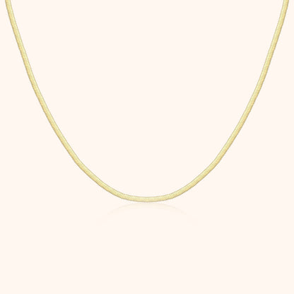 Goldene Schlangenkette, 18 Karat, elegantes Design, Schmuck für Damen, luxuriöses Accessoire.