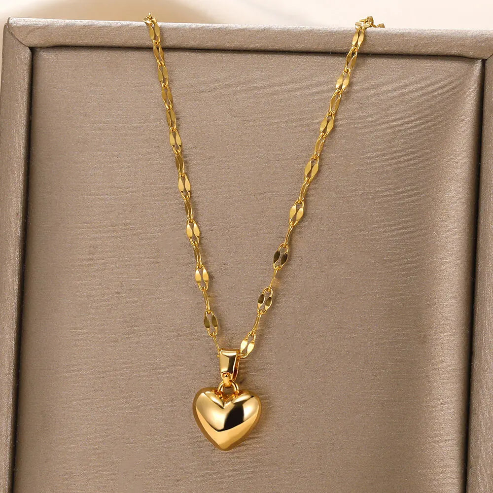 Goldene Herz-Halskette, glänzend, elegantes Design, Schmuck für Damen, Geschenkidee.