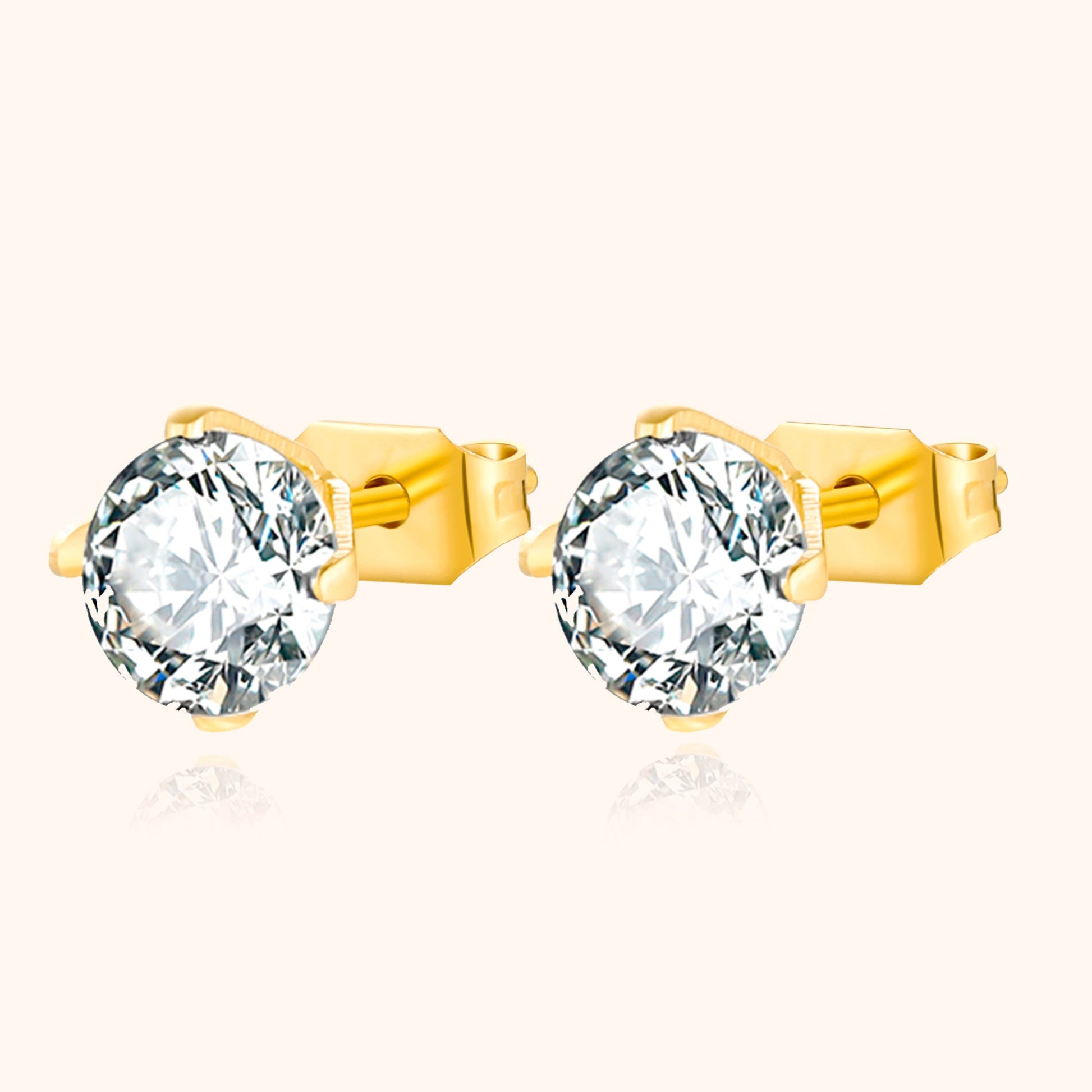 Goldene Ohrstecker mit klaren Zirkonia-Steinen, eleganter Schmuck, Damenaccessoire.