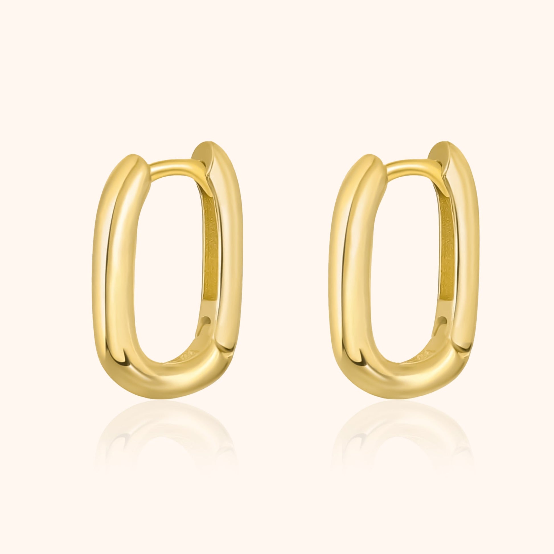 Goldene ovale Creolen Ohrringe, glänzend, modisch, Schmuck für Damen.