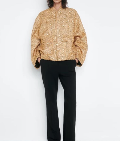 Goldene Paillettenjacke Damen, elegant, modisch, übergroß, schwarze Hose, Abendmode.