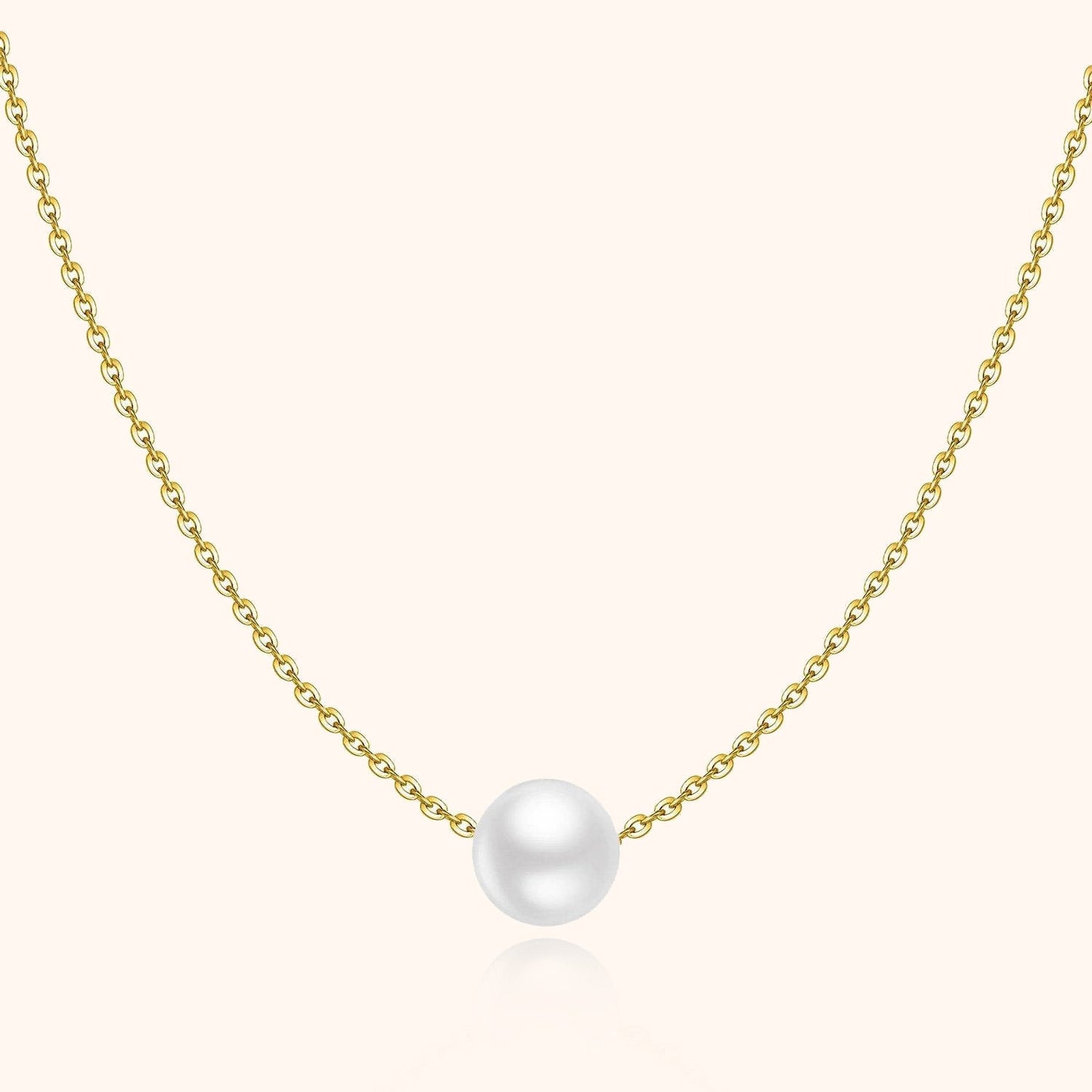 Goldene Halskette mit weißer Perle, eleganter Schmuck, Damenaccessoire, Geschenkidee.