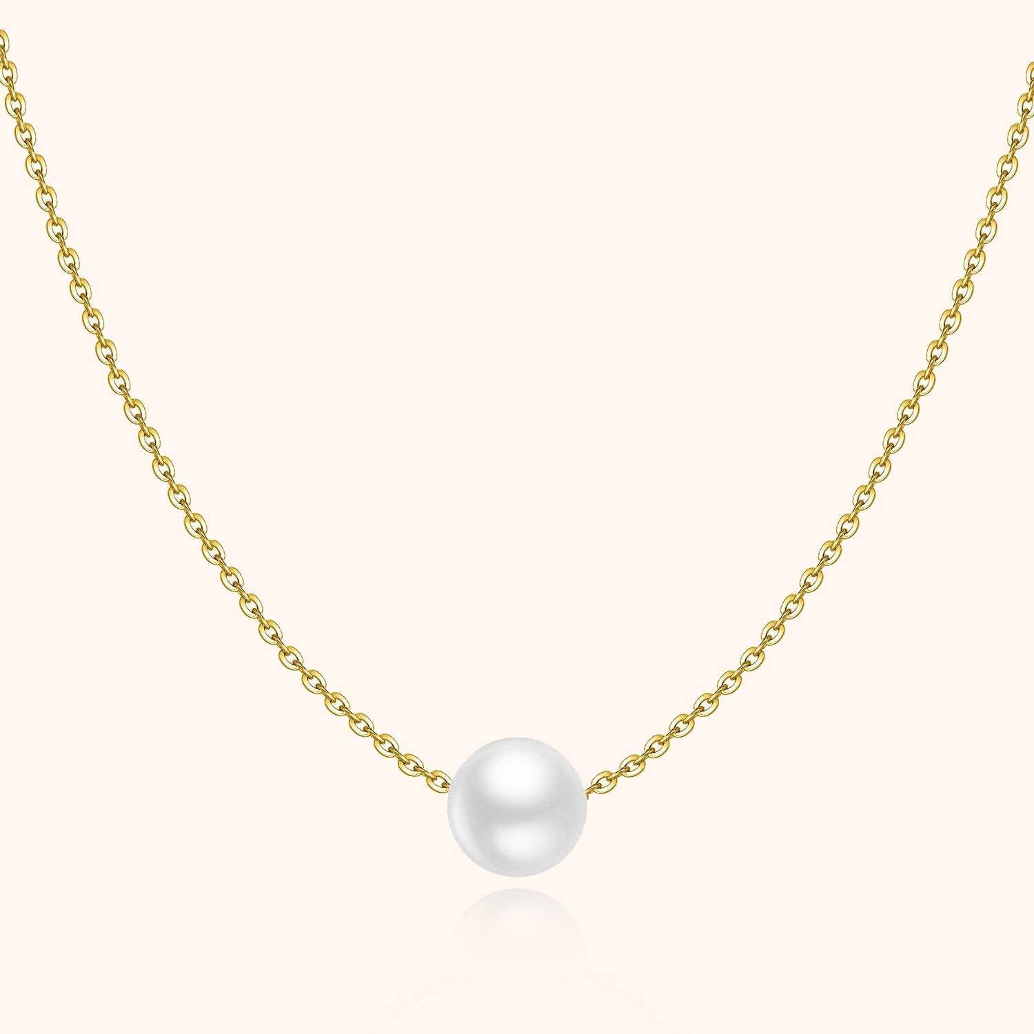 Goldene Halskette mit weißer Perle, eleganter Schmuck, Damenaccessoire, Geschenkidee.