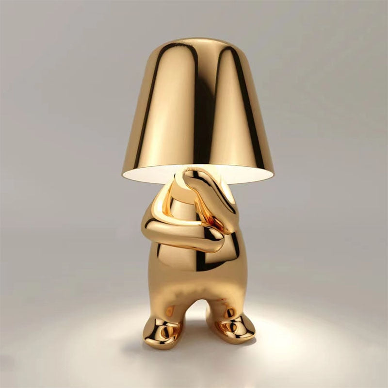 Goldene Tischlampe in Hasenform, modernes Design, Metall, dekorative Beleuchtung.