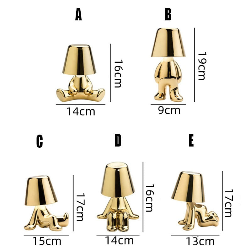 Fünf goldene Tischlampen in menschlicher Form, verschiedene Größen, moderne Wohnkultur.