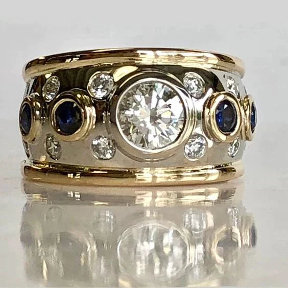 Goldener Diamantring mit blauen Saphiren, luxuriöses Schmuckdesign, glänzend und elegant.