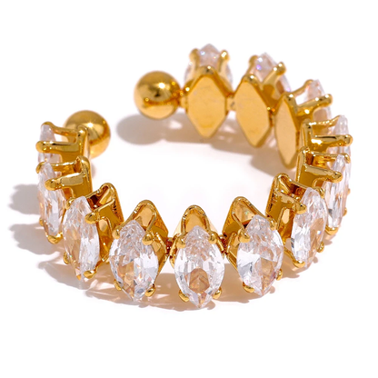 Goldener Ohrclip mit Kristallen, eleganter Modeschmuck, funkelndes Accessoire für Damen.