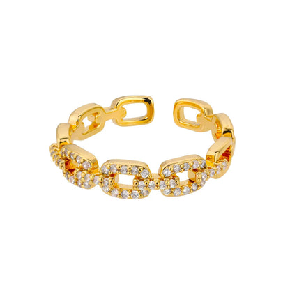 Goldener Ring mit Kettengliedern und Zirkonia-Steinen, eleganter Schmuck für Damen.