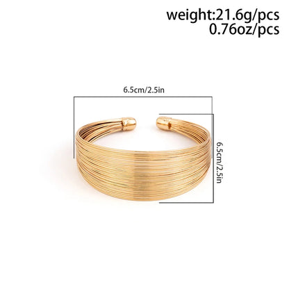 Goldenes Armreif-Set, 6,5 cm Durchmesser, 21,6 g, modisches Schmuck-Accessoire.