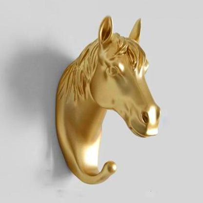 Goldener Pferdekopf-Wandhaken, dekorativ, Metall, modernes Design, Wohnaccessoire.