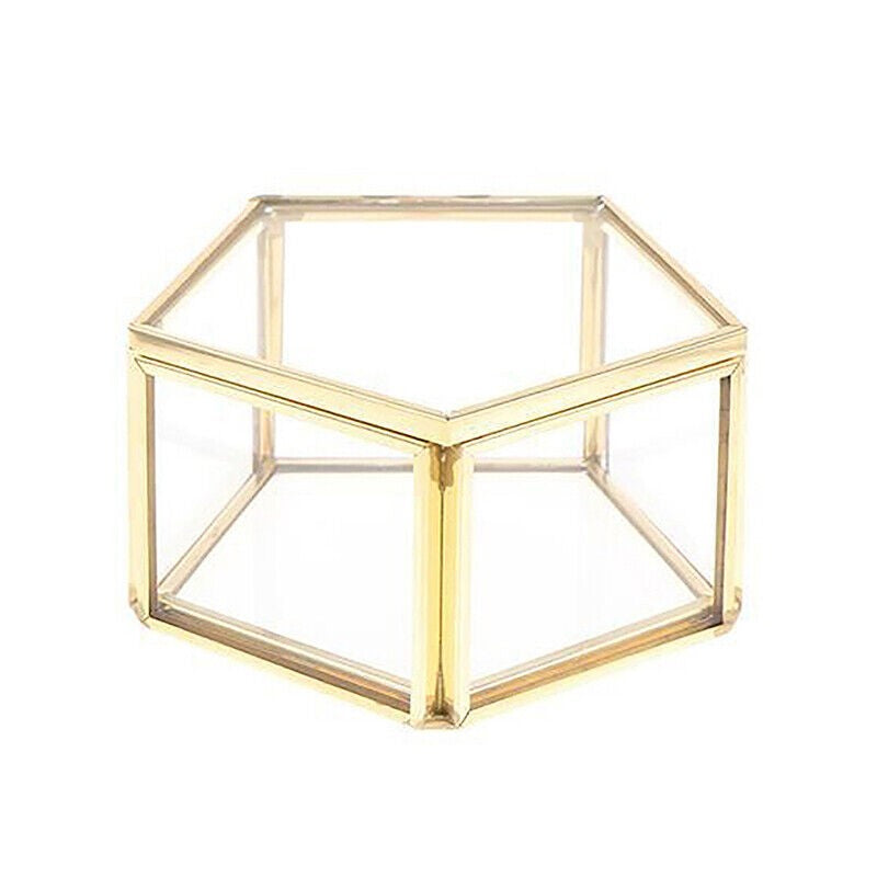 Goldene sechseckige Glasbox, Schmuckaufbewahrung, transparent, dekorativ, modern, stilvoll.