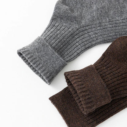 Graue und braune Strickpullover-Ärmel aus Wolle, modisch, warm, Herbst-Winter-Kleidung.