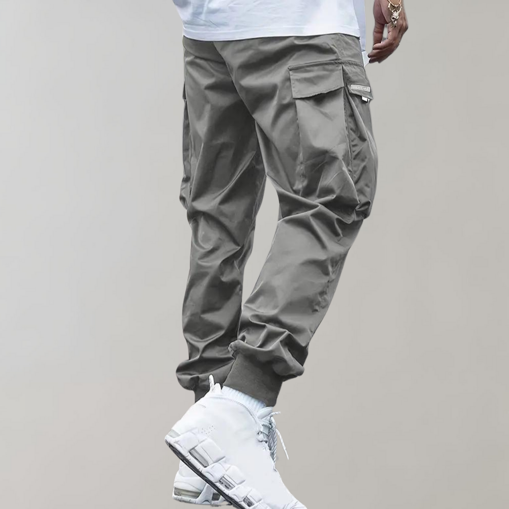 Graue Cargohose für Herren, lässig, mit Taschen, aus Baumwolle, modisch, urbaner Stil.