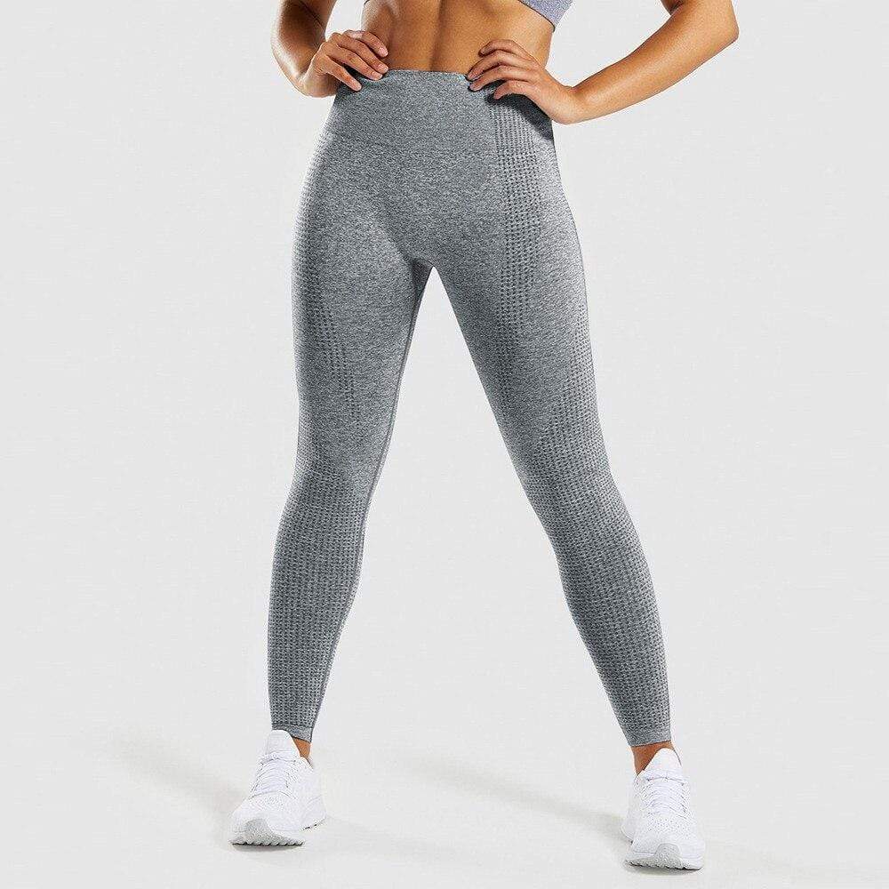 Graue, nahtlose Damen-Leggings, figurformend, elastisch, ideal für Sport und Fitness.