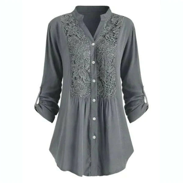 Graue Damenbluse mit Spitzenmuster, langen Ärmeln, Knopfleiste, elegant und modisch.