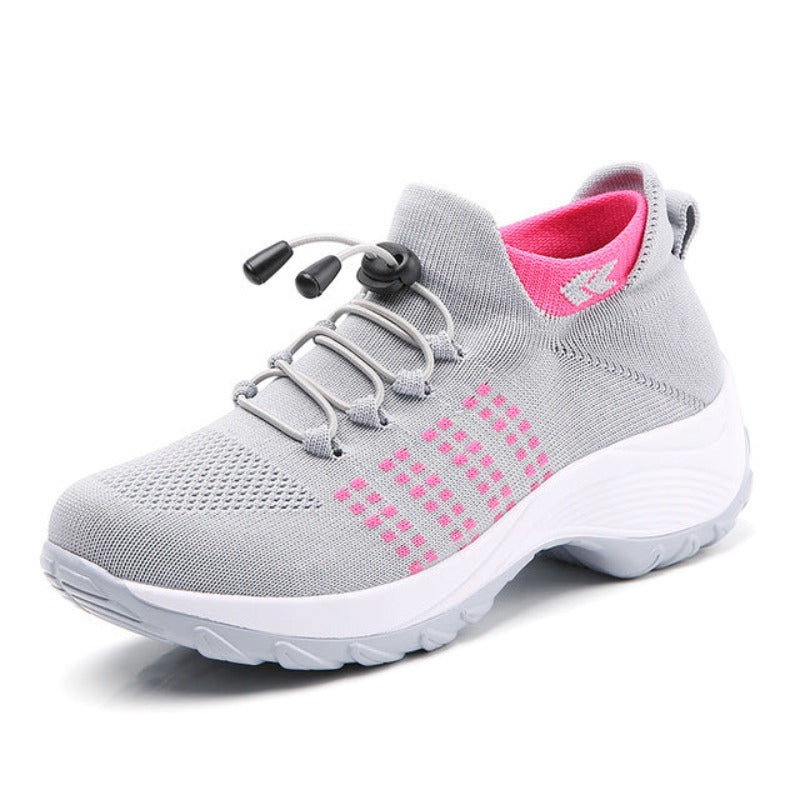 Grauer Damen-Sneaker mit rosa Akzenten, atmungsaktiv, rutschfest, ideal für Sport und Freizeit.