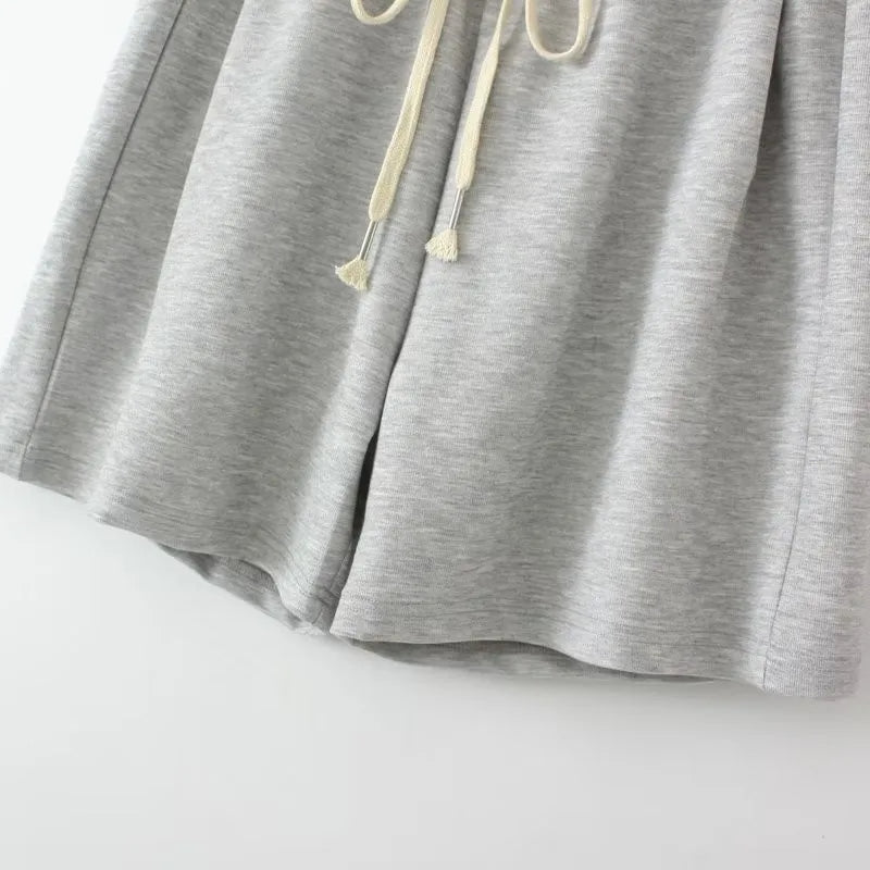 Graue Jogginghose aus Baumwolle mit Kordelzug, bequeme Sportbekleidung für Damen.