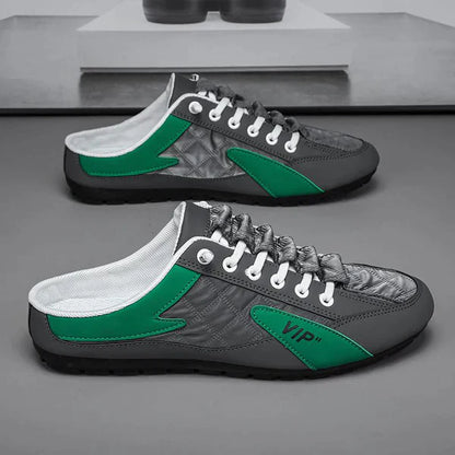Graue und grüne Herren-Sneaker, Leder, sportlich, lässig, mit Schnürsenkeln.