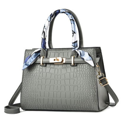 Graue Krokodilleder-Handtasche mit Schal, Damenmode, elegantes Design, Schulterriemen.