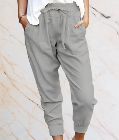 Graue Damen-Jogginghose aus Baumwolle, bequem, mit Kordelzug, ideal für Freizeitkleidung.