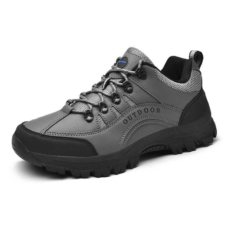 Grauer Outdoor-Wanderschuh, atmungsaktiv, rutschfest, ideal für Trekking und Wandern.