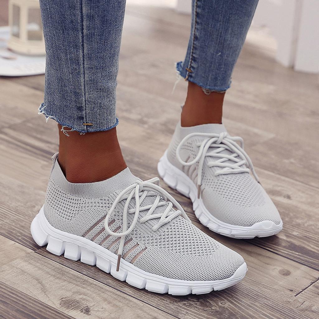 Graue Damen-Sneaker, atmungsaktiv, rutschfeste Sohle, ideal für Fitnessstudio und Sport.