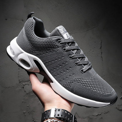Grauer Sportschuh Herren, atmungsaktiv, Mesh, rutschfeste Sohle, modisch, bequem.