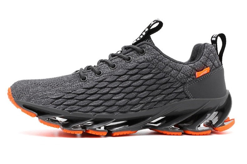 Grauer Sportschuh mit orangen Akzenten, atmungsaktives Mesh, rutschfeste Sohle, Herren Sneaker.