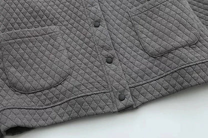 Graue gesteppte Jacke mit Taschen, Knöpfen, Baumwolle, modisch, warm, Herbstbekleidung.