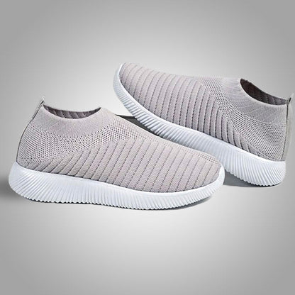 Graue Strick-Sneaker mit weißer Sohle, atmungsaktiv, rutschfest, für Herren und Damen.