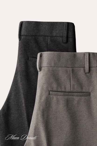 Graue und schwarze Herrenanzughosen aus Wolle, elegant, klassisch, Businessmode.