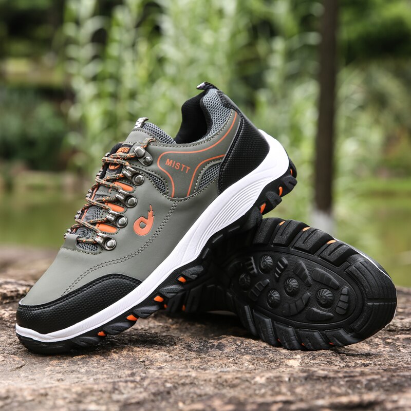 Graue Outdoor-Wanderschuhe, rutschfeste Sohle, atmungsaktiv, Herren, robust, bequem.