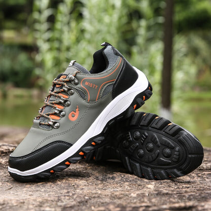 Graue Outdoor-Wanderschuhe, rutschfeste Sohle, atmungsaktiv, Herren, robust, bequem.