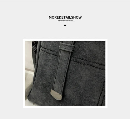 Graue Wildledertasche Detailansicht, modisches Design, hochwertige Verarbeitung.