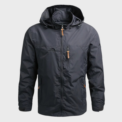 Graue Herrenjacke mit Kapuze, Reißverschlüssen und Taschen, wetterfest, Outdoor-Bekleidung.