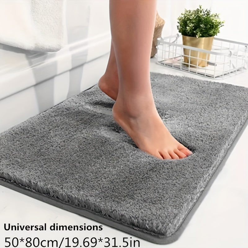Grauer rutschfester Badezimmerteppich, Memory-Schaum, 50x80 cm, weiche Oberfläche, Fußabdruck.