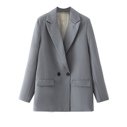 Grauer Damenblazer, zweireihig, elegant, Business-Mode, formell, klassisch, hochwertig.