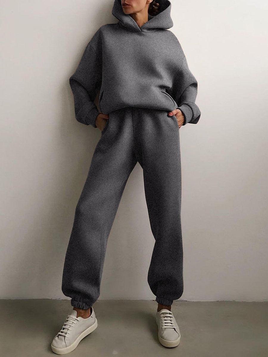 Grauer Damen-Hoodie und Jogginghose Set, lässig, bequem, ideal für Freizeitkleidung.