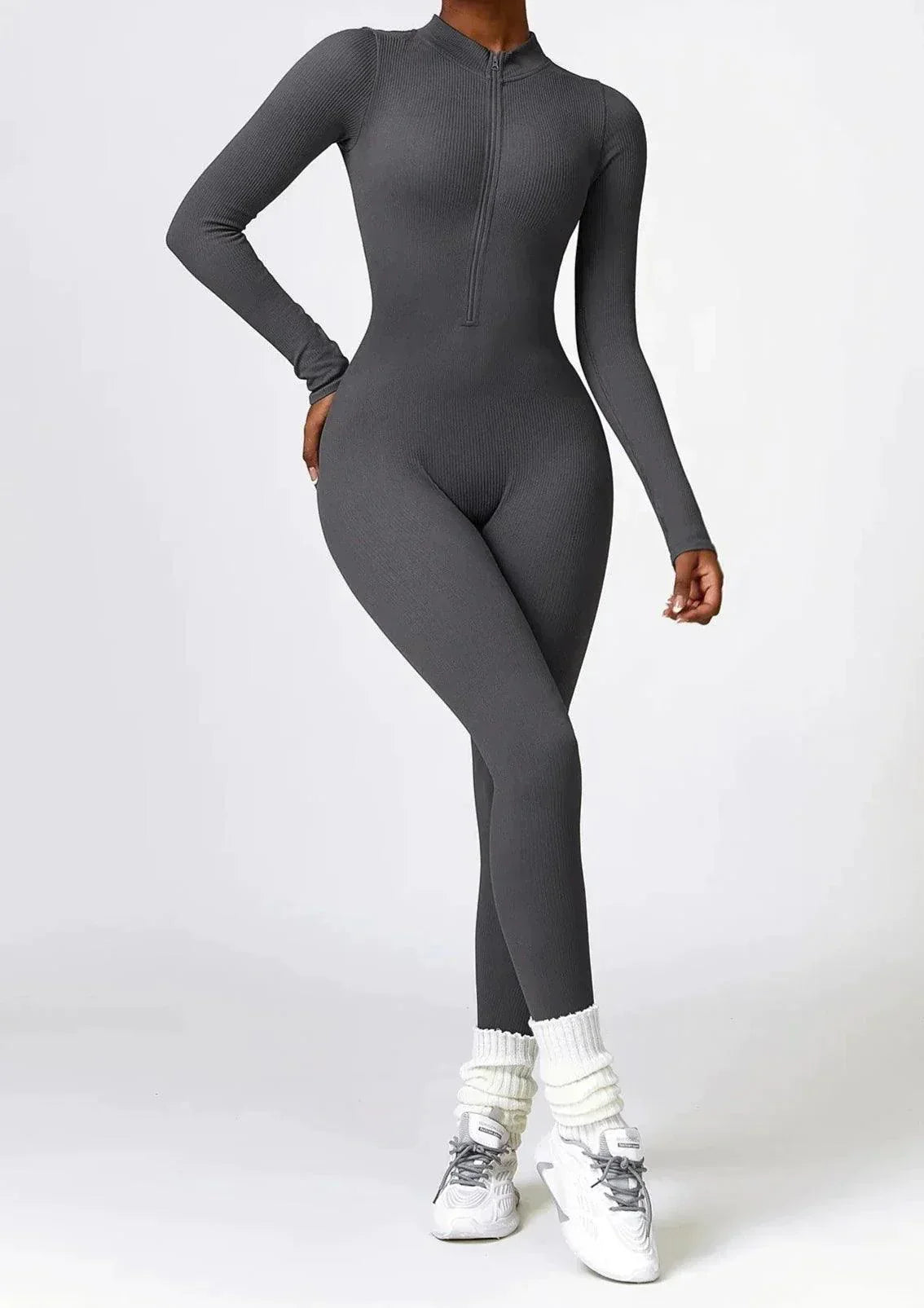 Damen-Ganzkörperanzug, grau, langärmelig, Reißverschluss, figurbetont, Sportbekleidung.