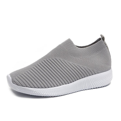 Grauer Sneaker aus Strickstoff mit weißer Sohle, atmungsaktiv, rutschfest, für Herren und Damen.