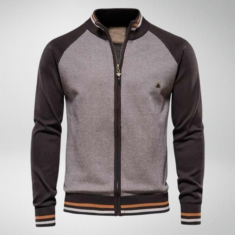 Graue Herren-Strickjacke mit Reißverschluss, schwarzem Kragen und gestreiften Bündchen.