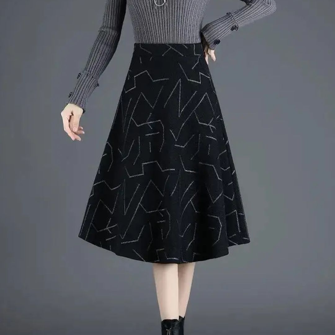 Damen A-Linien-Rock, schwarz, geometrisches Muster, knielang, elegantes Design, Herbstmode.