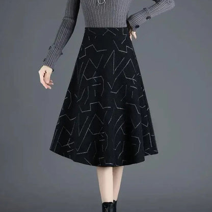 Damen A-Linien-Rock, schwarz, geometrisches Muster, knielang, elegantes Design, Herbstmode.