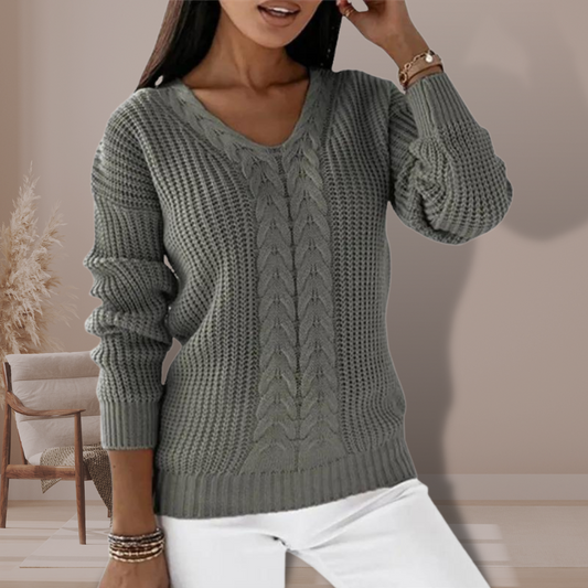 Damenpullover grau Strick V-Ausschnitt, modisch, bequem, Herbstmode, Freizeitkleidung.
